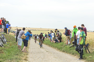 Image showing Jose Joao Mendes Pimenta Costa Riding on a Cobblestone Road - To