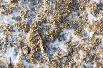 Image showing Dirty snow on walkway