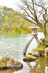 Image showing Famous stone lantern, Kotoji-toro, in Kenroku-en garden