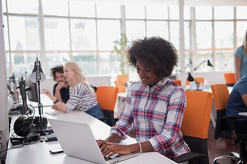 Image showing African American informal business woman working in the office