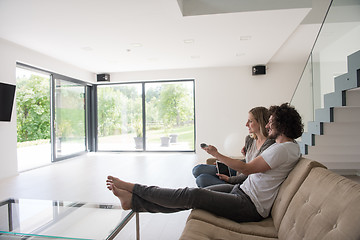 Image showing young couple relaxes in the living room