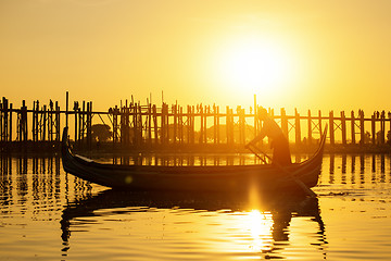 Image showing Fishman under U bein bridge at sunset