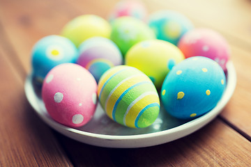 Image showing close up of colored easter eggs on plate