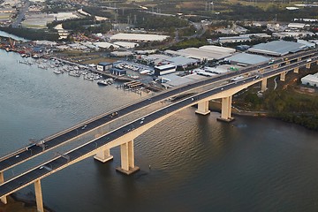 Image showing Highway bridge over river, aerial view