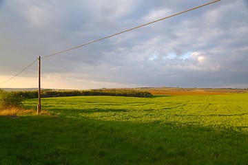 Image showing Agircutural landscape with clouds