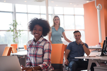 Image showing African American informal business woman working in the office