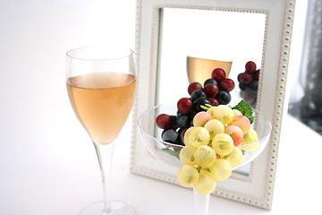 Image showing Isolated Grapes In a Glass