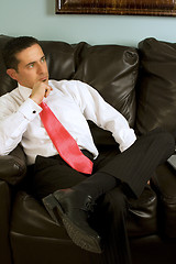 Image showing Businessman Sitting on the Couch