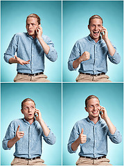 Image showing The young smiling caucasian man on blue background