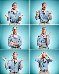 Image showing The surprised young man over blue background