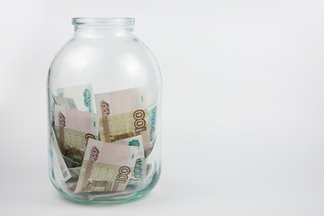 Image showing Three-liter jar with Russian rubles next blank space for writing