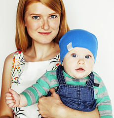 Image showing young beauty mother with cute baby, red head happy modern family