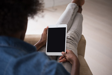 Image showing african american woman at home with digital tablet