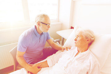 Image showing senior couple meeting at hospital ward