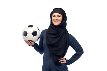 Image showing happy muslim woman in hijab with football