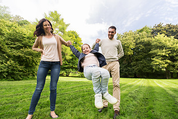 Image showing happy family walking in summer park and having fun