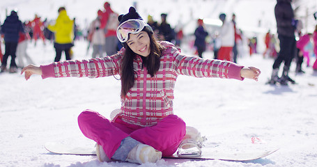 Image showing Carefree young woman on skiing holiday