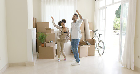 Image showing Young couple dancing for joy