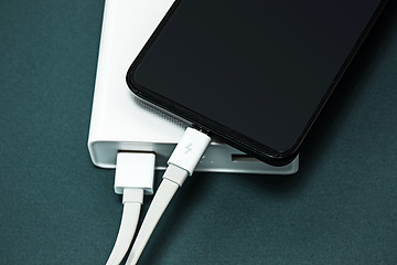 Image showing Power bank and mobile phone