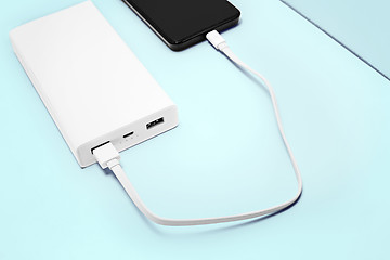 Image showing Power bank and mobile phone