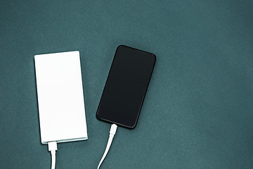 Image showing Power bank and mobile phone