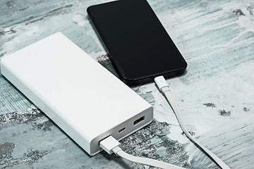 Image showing Power bank and mobile phone