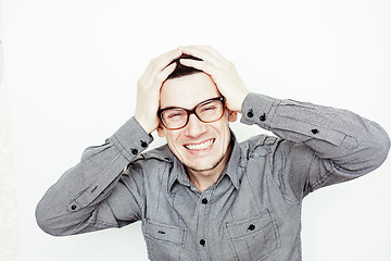 Image showing young handsome well-groomed guy posing emotional on white background, lifestyle people concept