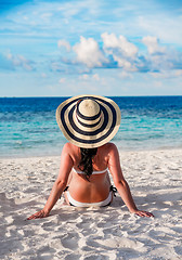 Image showing Woman and tropical beach in the Maldives.