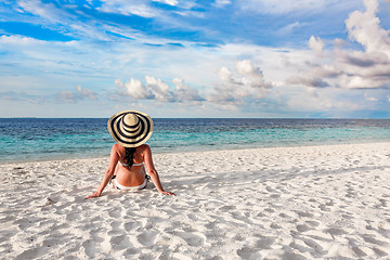 Image showing Woman and tropical beach in the Maldives.