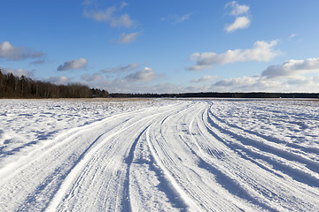 Image showing traces of the car on snow