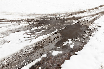 Image showing traces of the car on snow