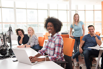 Image showing African American informal business woman working in the office