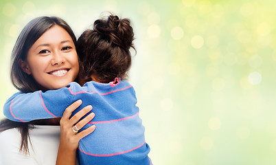 Image showing happy mother and daughter hugging