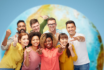 Image showing international group of people showing thumbs up