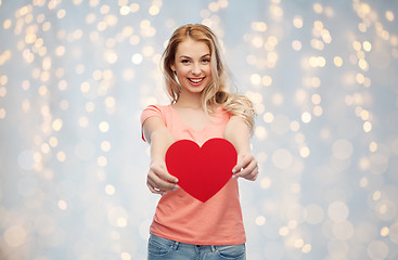 Image showing happy woman or teen girl with red heart shape