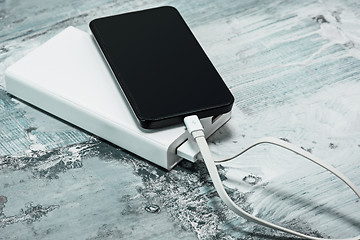 Image showing Power bank and mobile phone