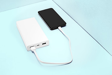Image showing Power bank and mobile phone