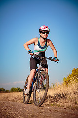 Image showing Women on bike