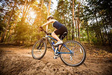 Image showing Women on bike