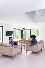 Image showing multiethnic couple in living room