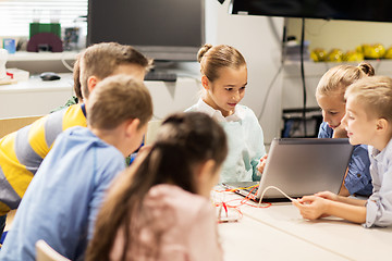 Image showing happy children with laptop at robotics school