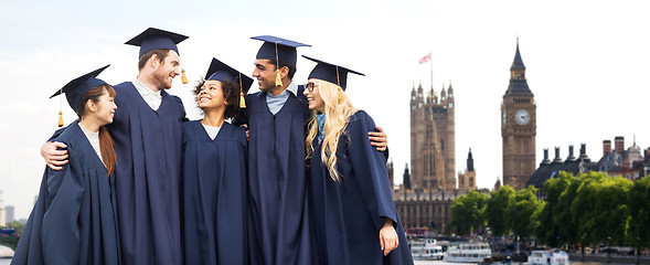 Image showing happy students or bachelors over london