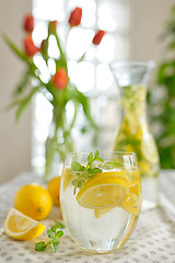 Image showing Fresh limes and lemonade