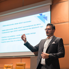 Image showing Speaker giving talk at Business Conference.