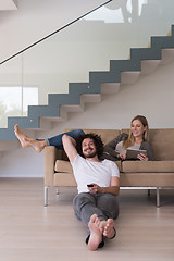 Image showing young couple relaxes in the living room