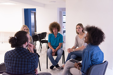 Image showing Multiethnic startup business team on meeting