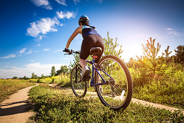 Image showing Women on bike