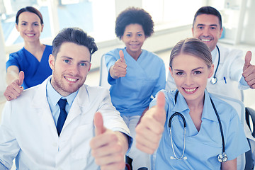 Image showing group of happy doctors on seminar at hospital