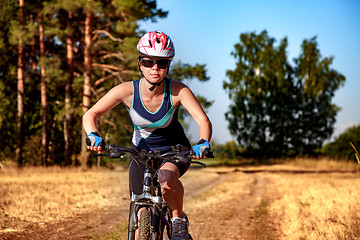 Image showing Women on bike