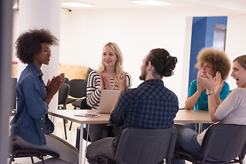 Image showing Multiethnic startup business team on meeting